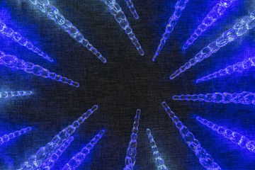 New Year's, Christmas decorations of garlands in the form of icicles on a gray background