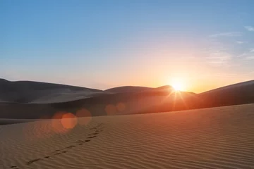 Foto auf Acrylglas Sandige Wüste Wüste im Sonnenuntergang