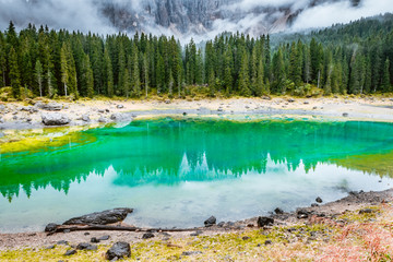 Carezza lake or Lago di Carezza, Karersee in Dolomites Alps. South Tyrol Italy