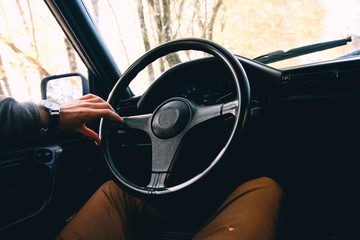 Ride a retro car in the autumn. premium driver vintage cars.