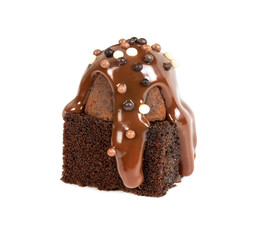 Brownie with chocolate truffle, covered milk chocolate syrup and decorative sprinkling