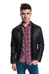 Fototapeta premium portrait of relaxed casual man wearing plaid shirt and jacket
