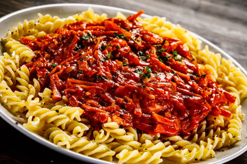 Fusilli with meat, tomato sauce and vegetables