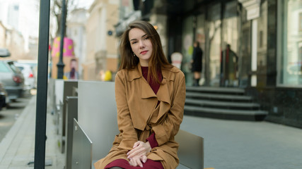Obraz premium Woman in vintage cloak at street.