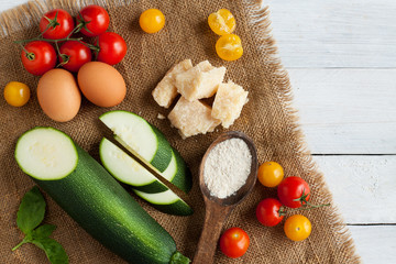 Ingredients for healthy pizza with zucchini crust