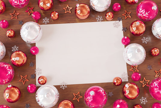 Christmas card mockup with pink baubles 3D rendering