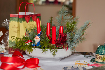 classic Advent arrangement with burnt red candles