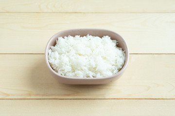 Cooked rice in ceramic bowl