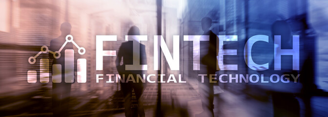 FINTECH - Financial technology, global business and information Internet communication technology. Skyscrapers background. Hi-tech business concept.