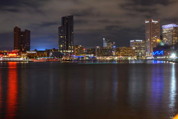 View of Inner Harbor in Baltimore, Maryland at night.