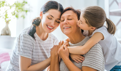 girl, her mother and grandmother
