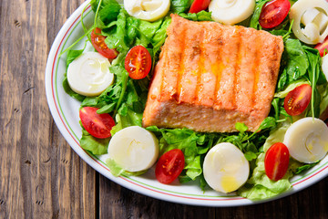 fresh salad with salmon and vegetables
