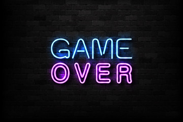 Vector realistic isolated neon sign of Game Over logo for decoration and covering on the wall background. Concept of gaming.