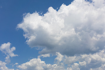 Naklejka na ściany i meble Blue clean sky with white clouds.