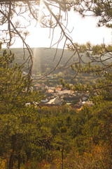 view to a village in autumn at golden hour