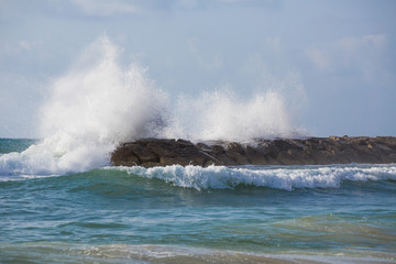  High waves hitting on breakwater