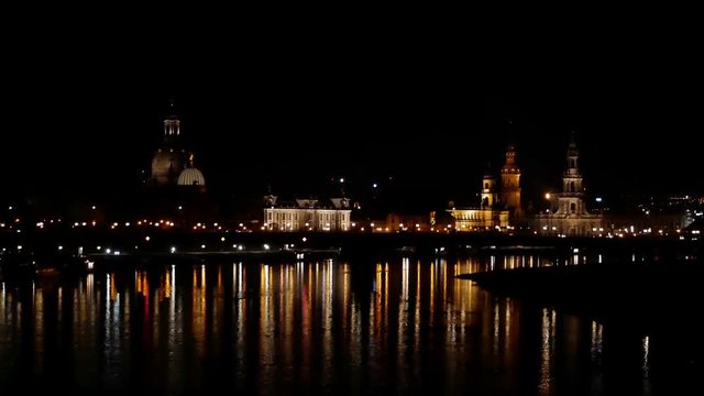 Long still then pan left to right: Night skyline in Dresden, with view over the historic old town from the Carola Bridge. (Saxony, Germany)