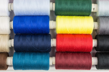spools of sewing thread in various colors