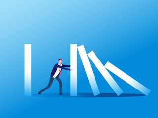 Domino effect. Businessman stopping falling domino. Crisis management, finance intervention and conflict prevention vector concept. Business management stop domino effect illustration © MicroOne