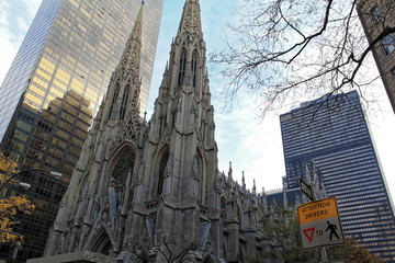 New York, USA - November 20: View of the facade of St. Patrick's Cathedral and skyscrapers in New York City,