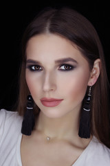 Obraz premium Makeup smokey ice for a girl on a black background