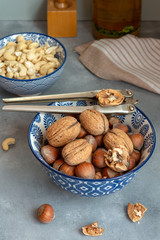 Obraz na płótnie Canvas Different types of nuts in a bowl.