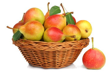 Pears in basket isolated on white