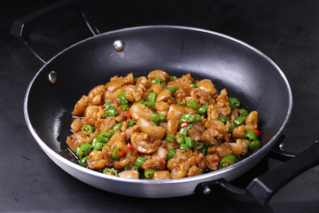 Stir fry minced pork in a pan