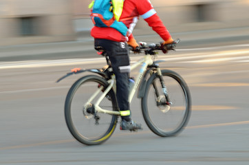 Cyclist rides on the road.