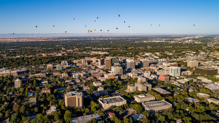 Aerial view of Boise Idaho with hot air balloons in the sky