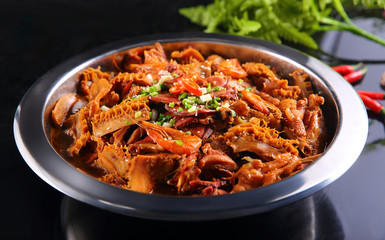 Beef offal in clay pot