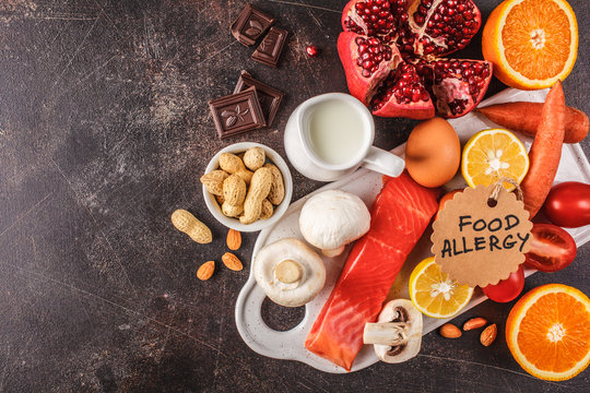 Allergy food concept. Allergies to fish, eggs, citrus fruits, chocolate, mushrooms and nuts.