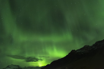 Fototapeta na wymiar Aurora Boreal en Islandia