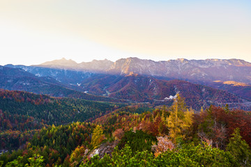 Autumn sunset lanscape in Austrian Alps with mountains and forest. Salzkammergut region.