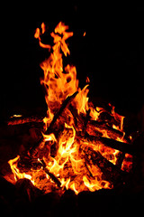 Large burning bonfire with soft glowing flame