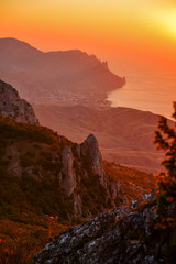 Sunset in the mountains on the sea coast