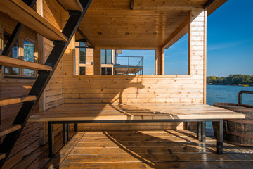 Resting place on balcony of river house