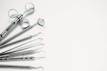 dental and endodontic restoration instruments on a white background. Top view