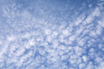 Fototapeta na wymiar Blue sky and broken clouds