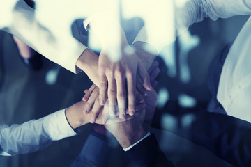 Business people putting their hands together. Concept of startup, integration, teamwork and...