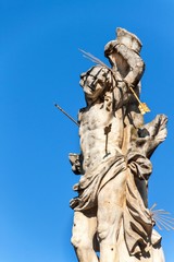 Baroque statues of saints. Detail of baroque plague column in the town of Valtice in southern Moravia. Work of art. Built in 1690.