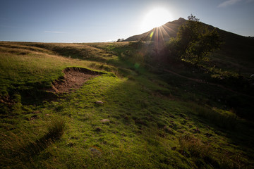 Thorpe Cloud, Dovedale, Peak District, in front of the Sun on a summers day