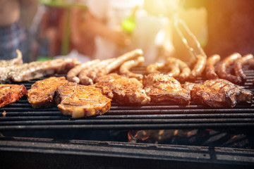 Barbecue, fry steaks, meat ribs and sausages, weekend