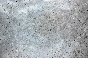 Metal plate silvery as a background, worn aluminum texture