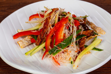 Asian salad with salmon skin