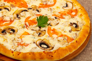 Pizza with mushroom and tomato