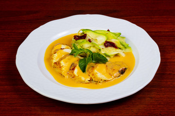 Chicken breast in orange sauce