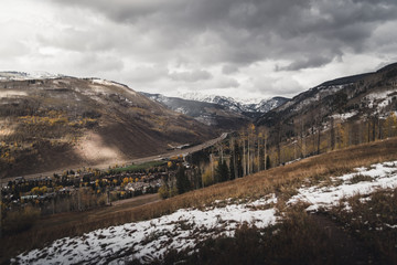 Landscape view of East Vail with the Gore Range in the background after an autumn snow storm. 