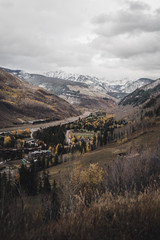 Naklejka premium Landscape view of East Vail with the Gore Range in the background after an autumn snow storm. 