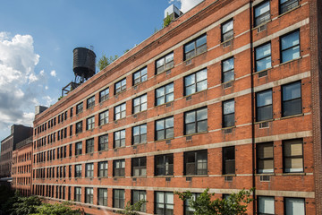 Old bricks building facade, Manhattan, USA